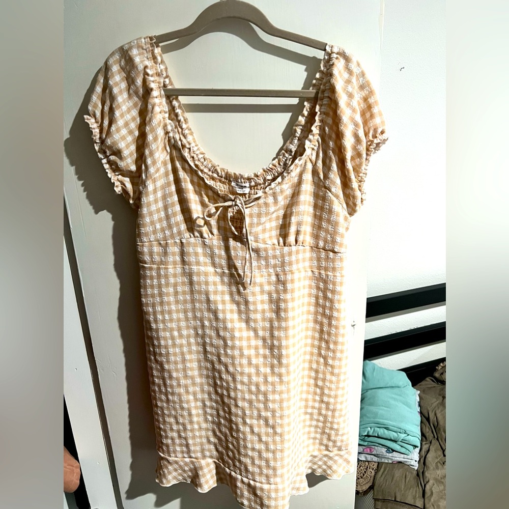 Cream gingham dress.
